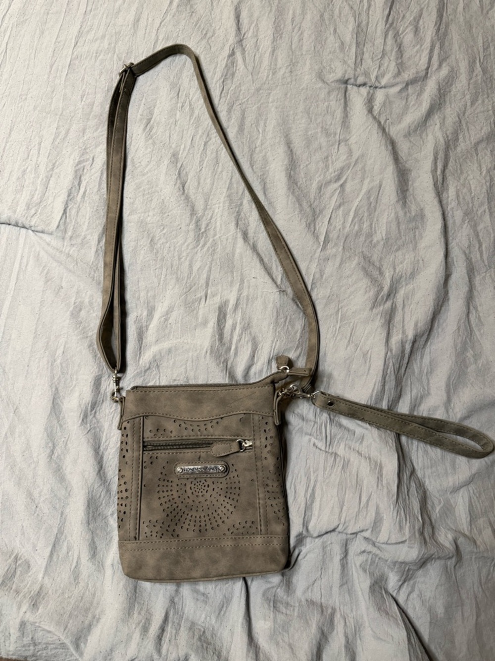 Stone Mountain Accessories Taupe Perforated Crossbody Bag